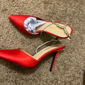 Azalea Wang red stiletto pumps